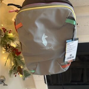 Cotopaxi Gray Backpack with Colorful Accents